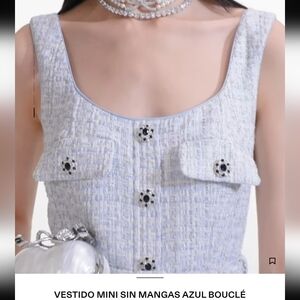 Mi Blue Bouclé Sleeveless Mini Dress.